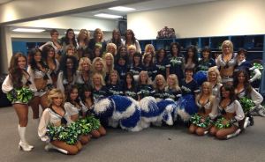 2013 Sea Gals with alumni in the locker room at the Seahawks vs. Bucs game 11-3-13.